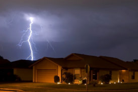 Lightning Strikes in the Night Near Family Houses — Northfield, IL — Raynor Door Company